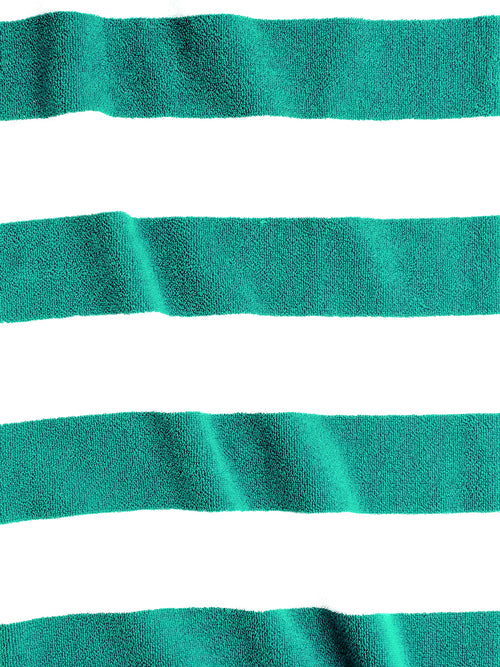 Close-up of a green and white striped fabric texture